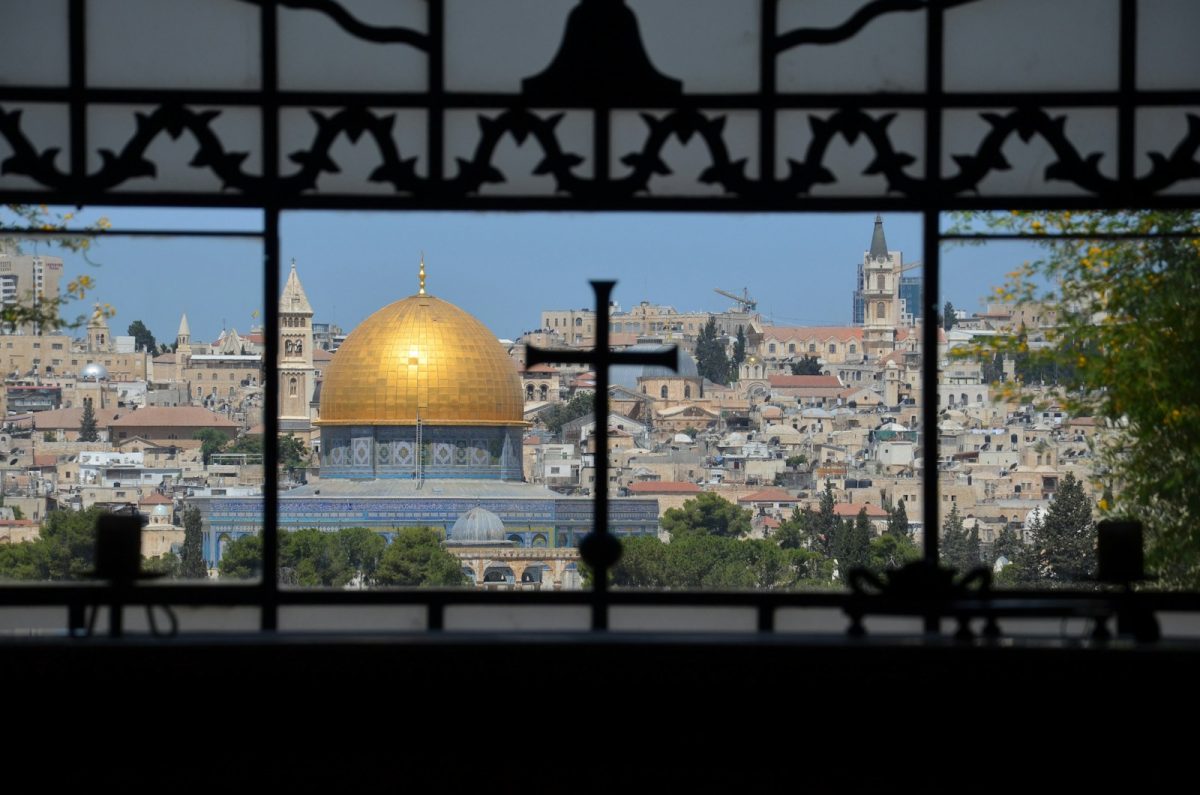 a view of the dome of the rock from a window