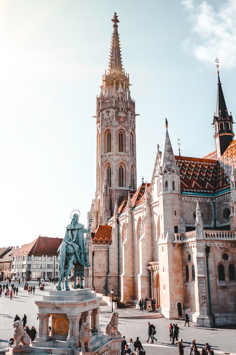 Statue in front of a cathedral in Budapest