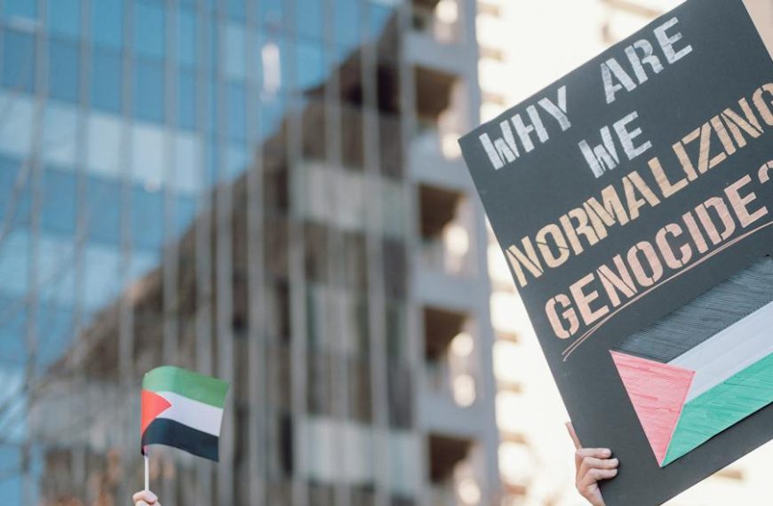 People with Flags and Banner at Antiwar Protest