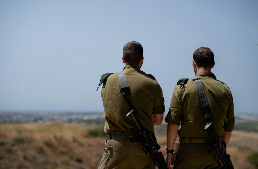 a couple of men in uniform