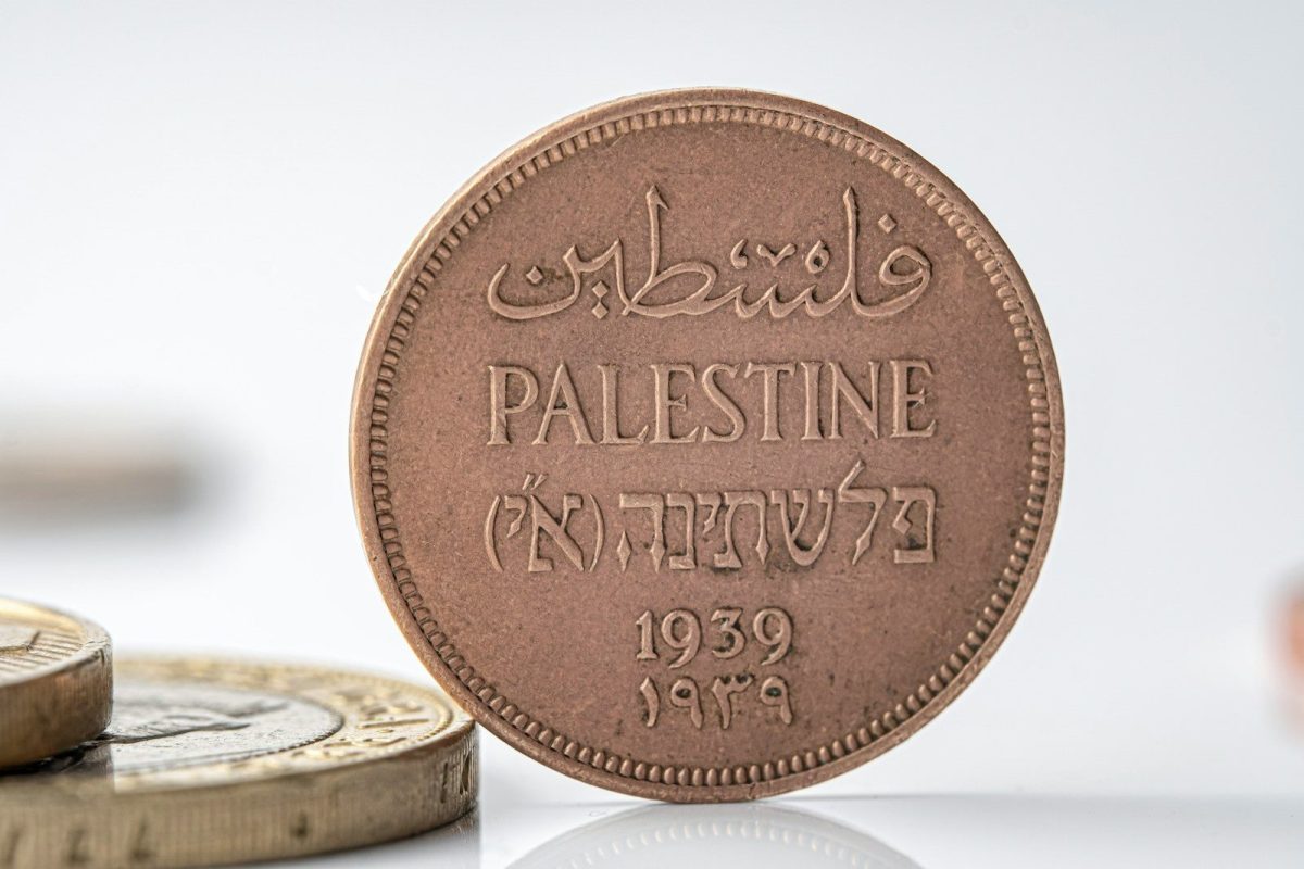 Vintage palestinian coin from 1939 with trilingual inscription.